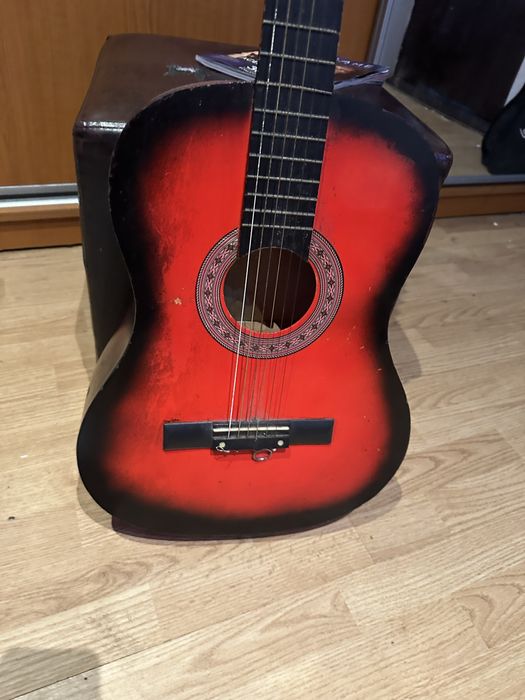 Chitara  acustica  doua la pret de una