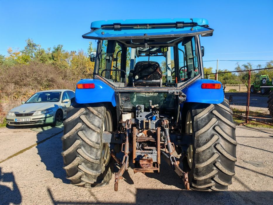 Tractor New Holland Tl 100 cu încărcător frontal quicke q 56