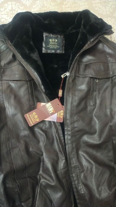 Продам новую мужскую куртку