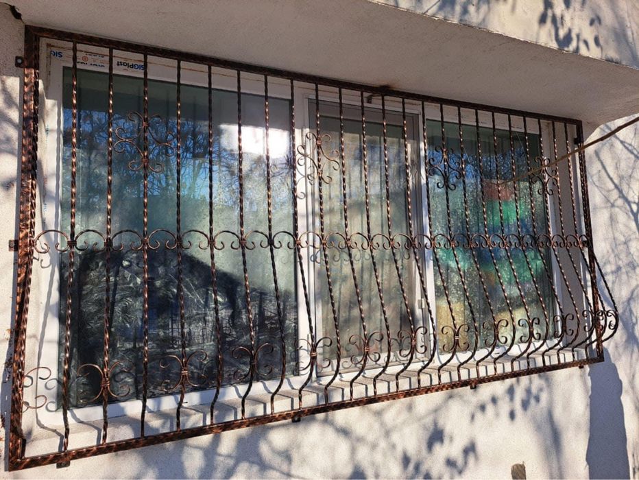 Gratii geamuri fier forjat