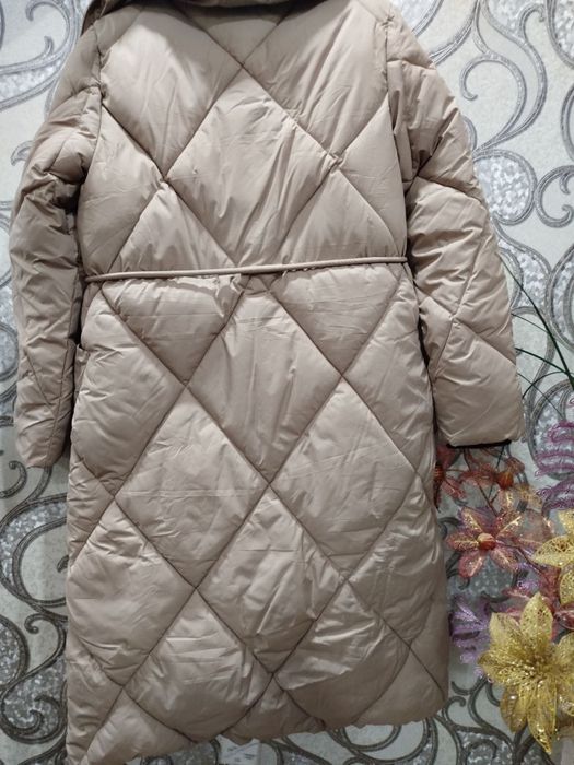 Женская куртка…….