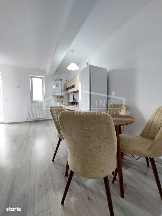 Apartament 2 dormitoare decomandate Open-space Garaj subteran inclus