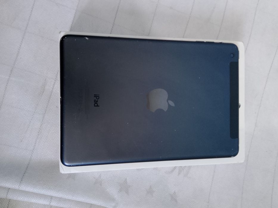 IPad Mini hotira 4 ga 32 iclod ochilgan karopka zaryatchik bor