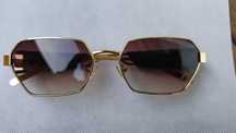 Ochelari de soare MiuMiu rama aurie