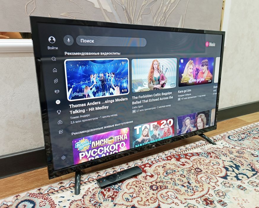 Смарт ТВ Xiaomi с голосовым управлением.
