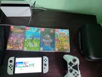 Nintendo switch OLED със игри и аксесоари.
