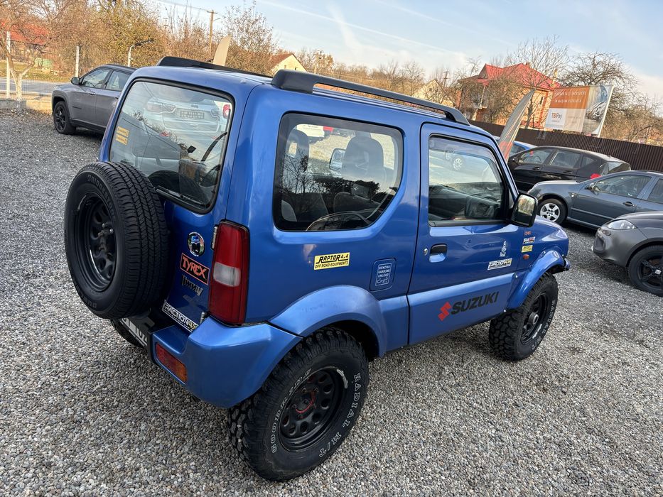 Suzuki Jimny - 1.3i - 2001 - AC - Blocant spate