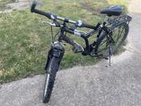 Vand bicicleta cu roti pe 26 inch pt baieti