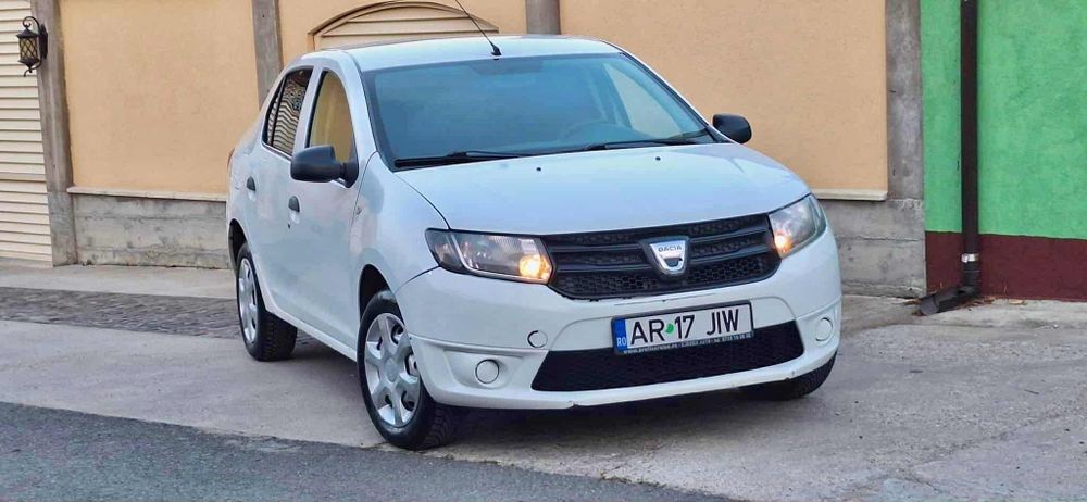 Vând sau schimb Dacia Logan