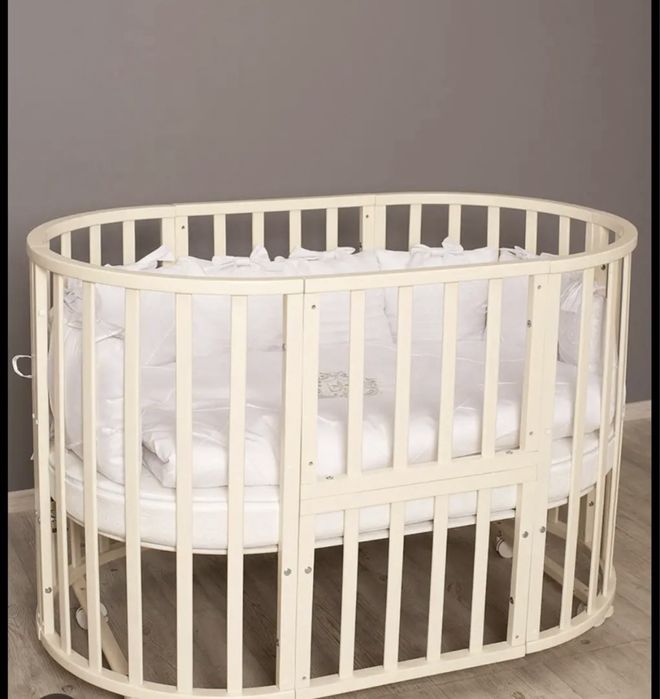 Кроватка с маятником