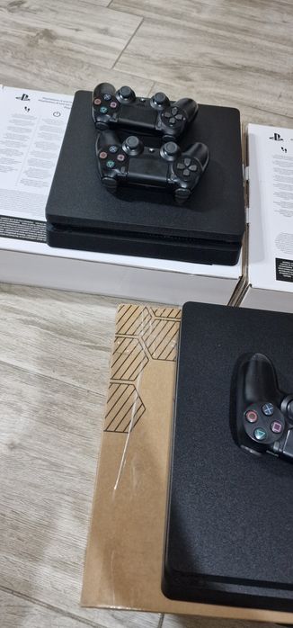 Playstation 4 Slim 500-1tb (4 jocuri fizice-12 digitale)