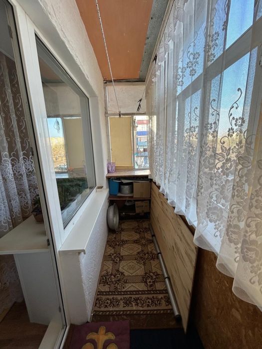 Двухкомнатная квартира в городе Лисаковск 5 микрорайон дом 1.