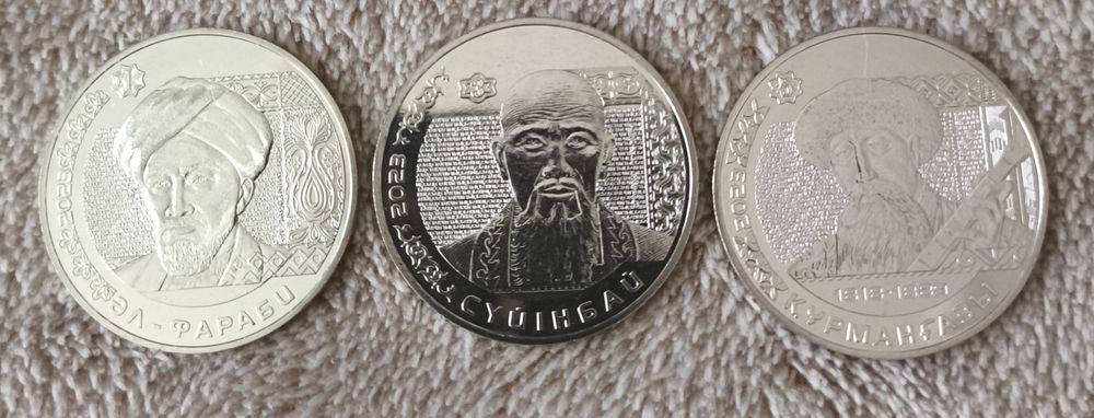 Монеты ,200 тенге.Курмангазы, Аль Фараби и Суюнбай.