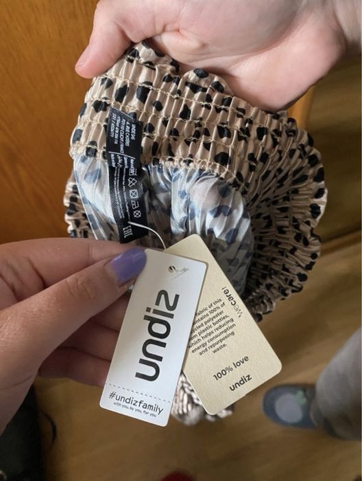 Pantaloni evazați animal print