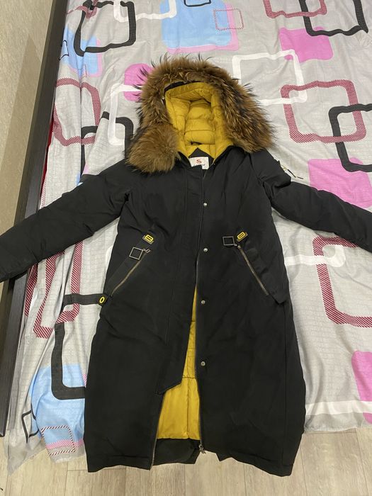 Женский пуховик.