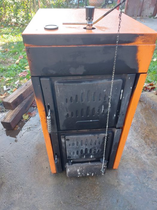 Vând centrala incalzire Ferolli pe lemne/carbune 30 kw