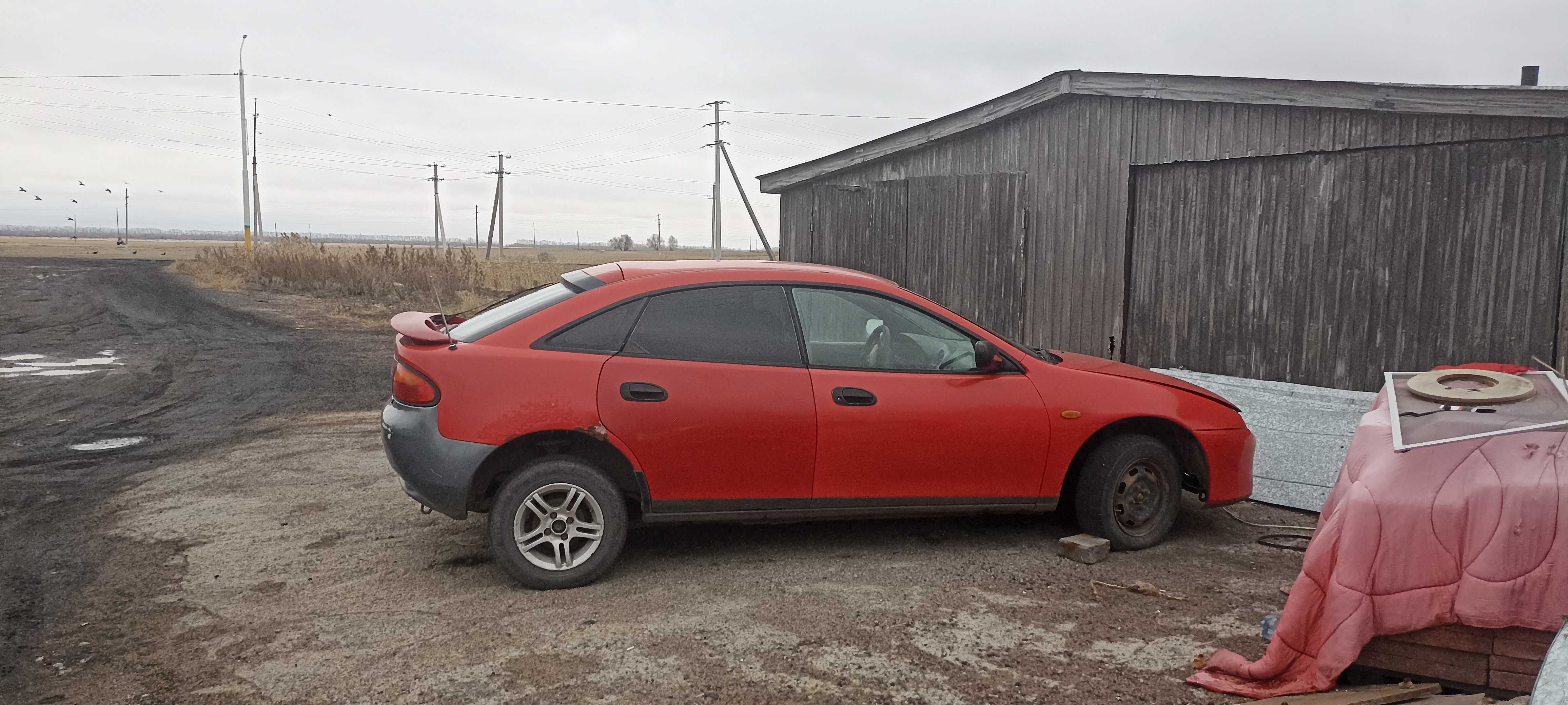 Продам машину Mazda323