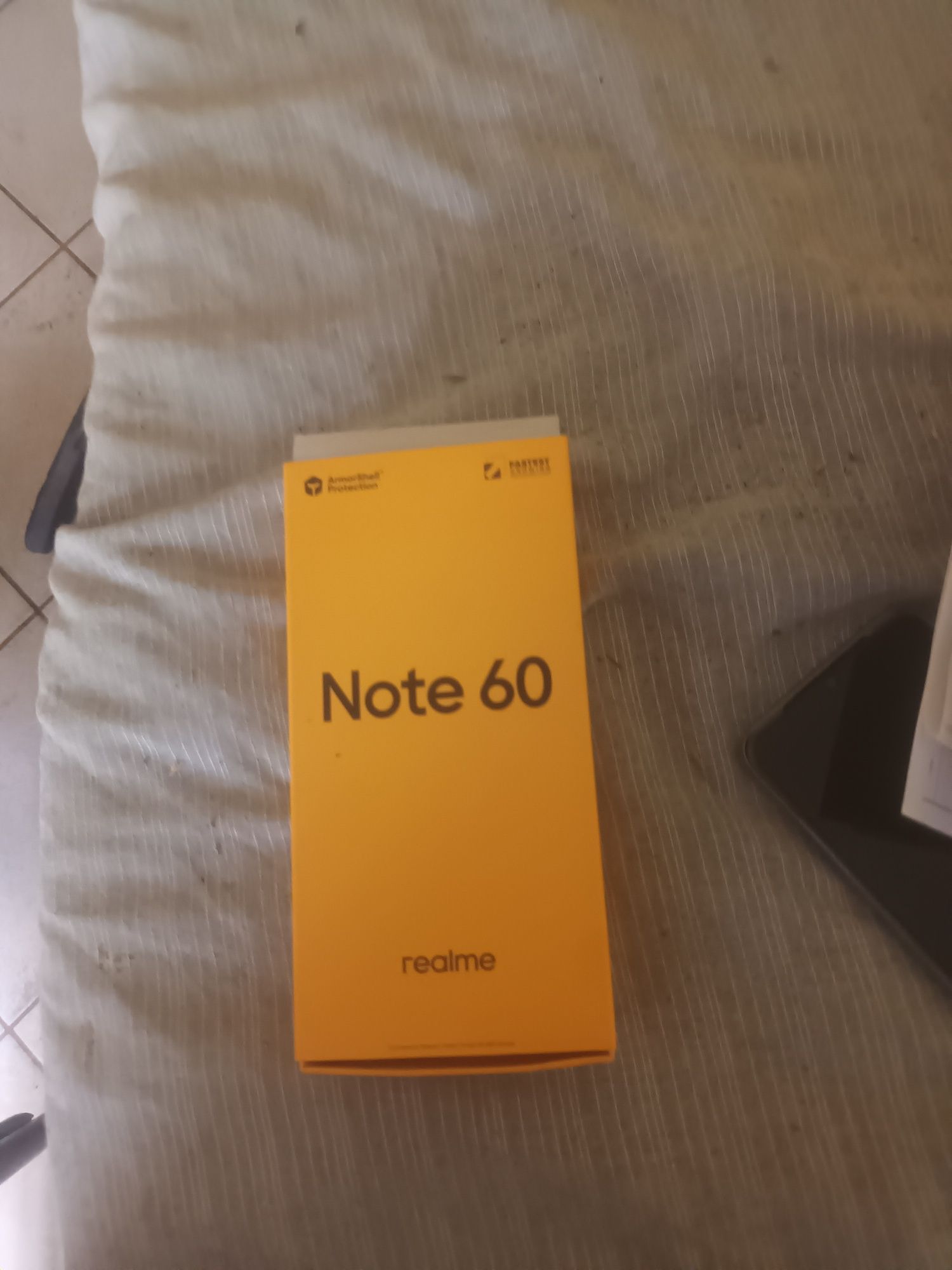 realme. note 60.