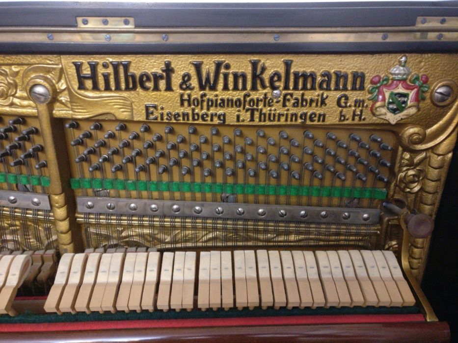 Pianina Hilbert Winkelmann placa bronz Germania
