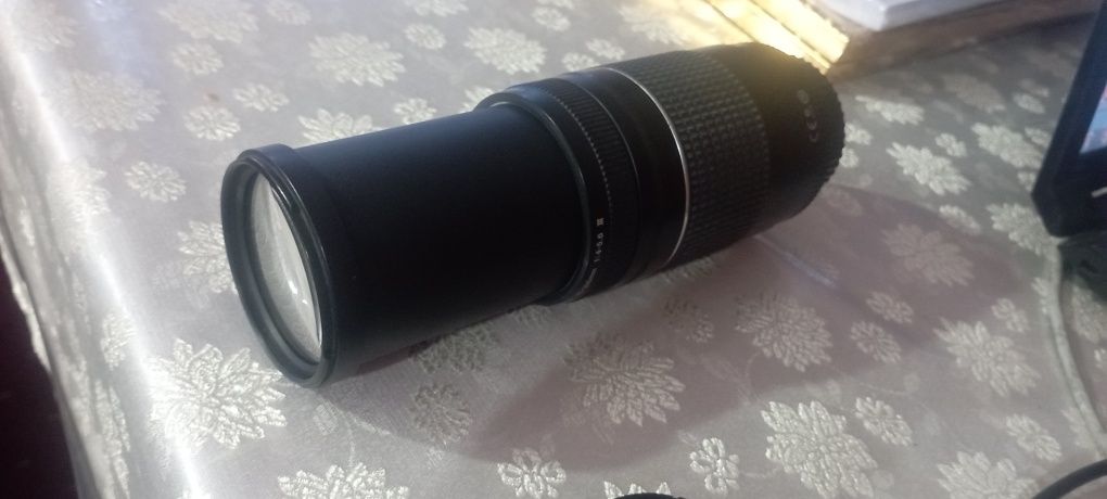 Canon obyektiv 75-300 xolati zo'r chetdan olib kelingan