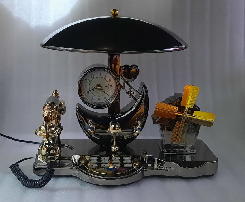 Telefon fix cu veioză, ceas și cutiuță muzicală