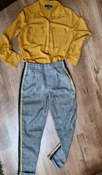 Vand pantaloni in carouri si bluza