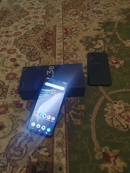 Сот телефон  V23e