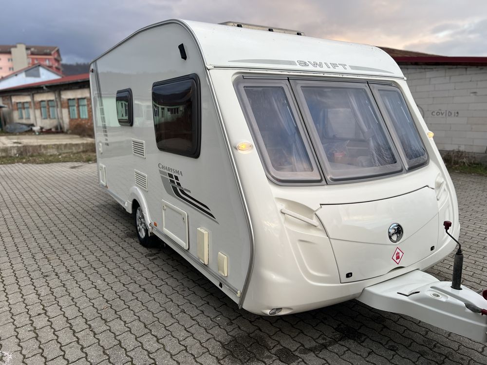 Rulota Swift Charisma  pt 2-3 pers an 2009 baie mare mover inm Ro