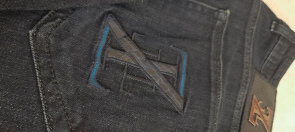 Мужеские джинсы в отличном состояние