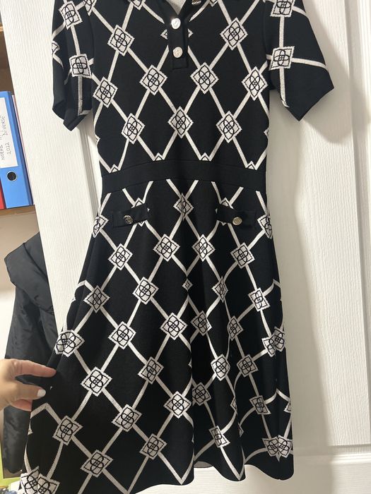 Vand rochita Motivi,marime M,lungime medie