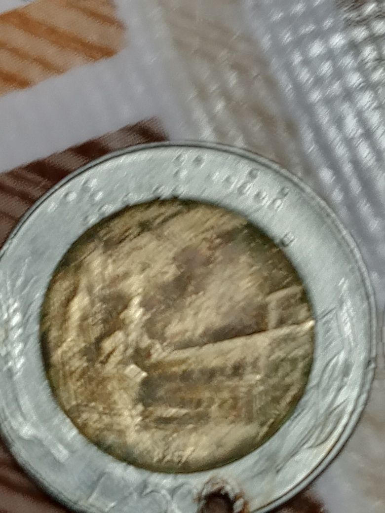 Vind o monedă italiana de 500 lire