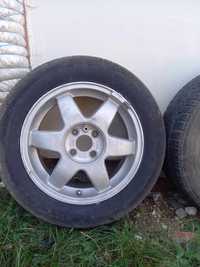 Продавам гуми с джанти за Опел Вектра 15цола 6 броя 4 летни 2 стоманен