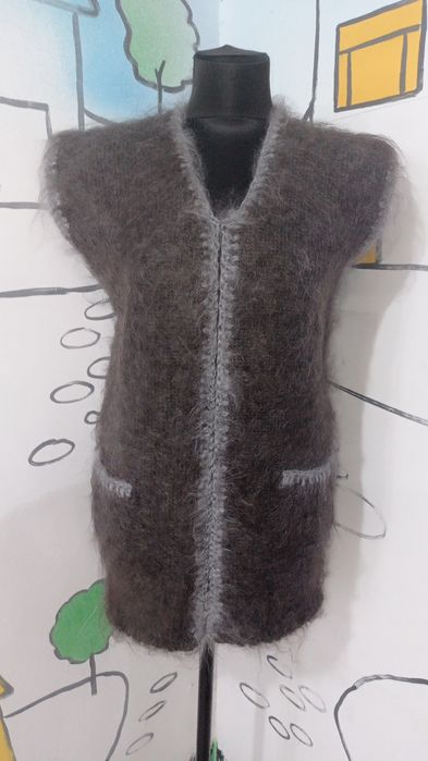 Продам жилет пуховый