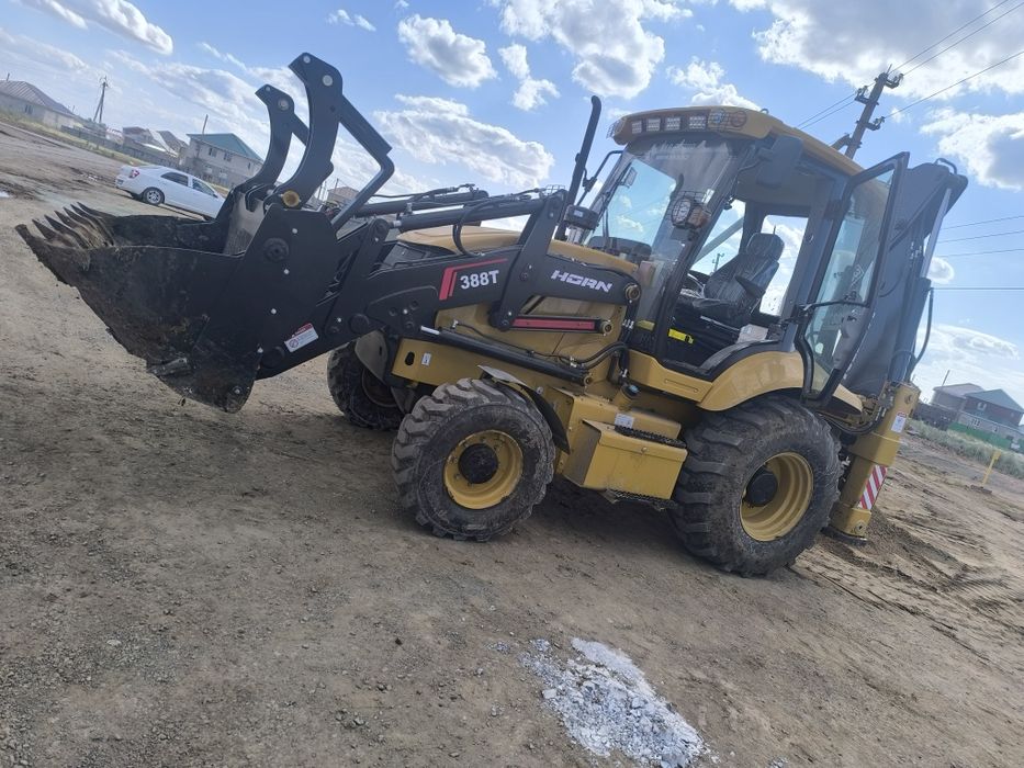 Аренда услуга экскаватор-погрузчик. (Петушок) Часовой работа.24/7