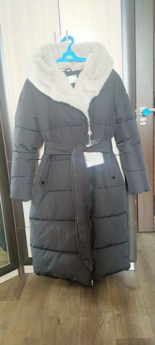 Продам новый зимний пуховик