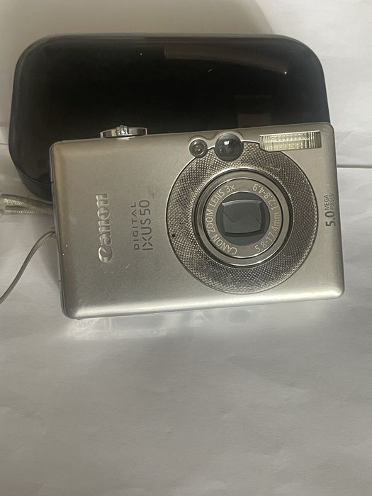 Canon Ixus 50 ,metal , made in Japan, afisaj data ora pe poze