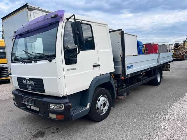 MAN 12.163 camion cu obloane rabatabile