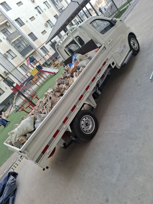 Строй мусир олиб кетиш