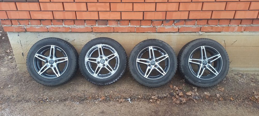 Продам тит.диски с шинами