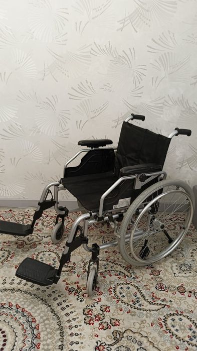 Инвалидная коляска