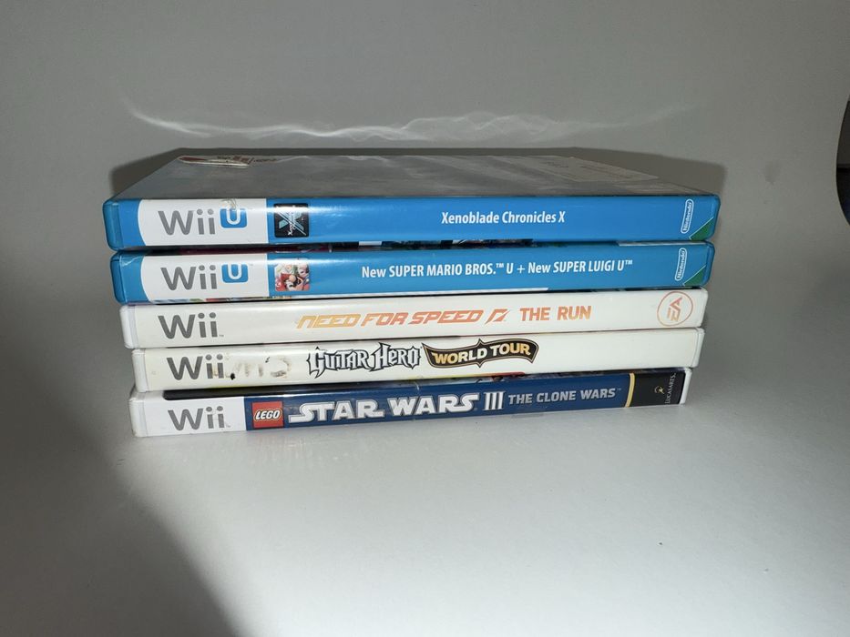 Nintendo Wii U plus packet de jocuri si extra remote
