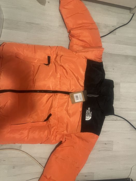 Geacă The North Face portocalie