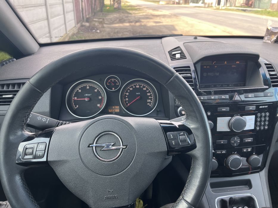 Zafira 1.7-diesel,7 locuri,panoramic,bixenon