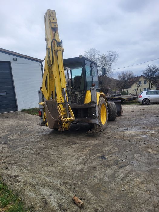 Vand buldoexcavator mf 750