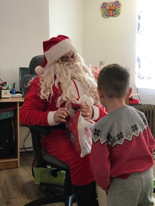 Moș Crăciun cu Chitară și Colinde