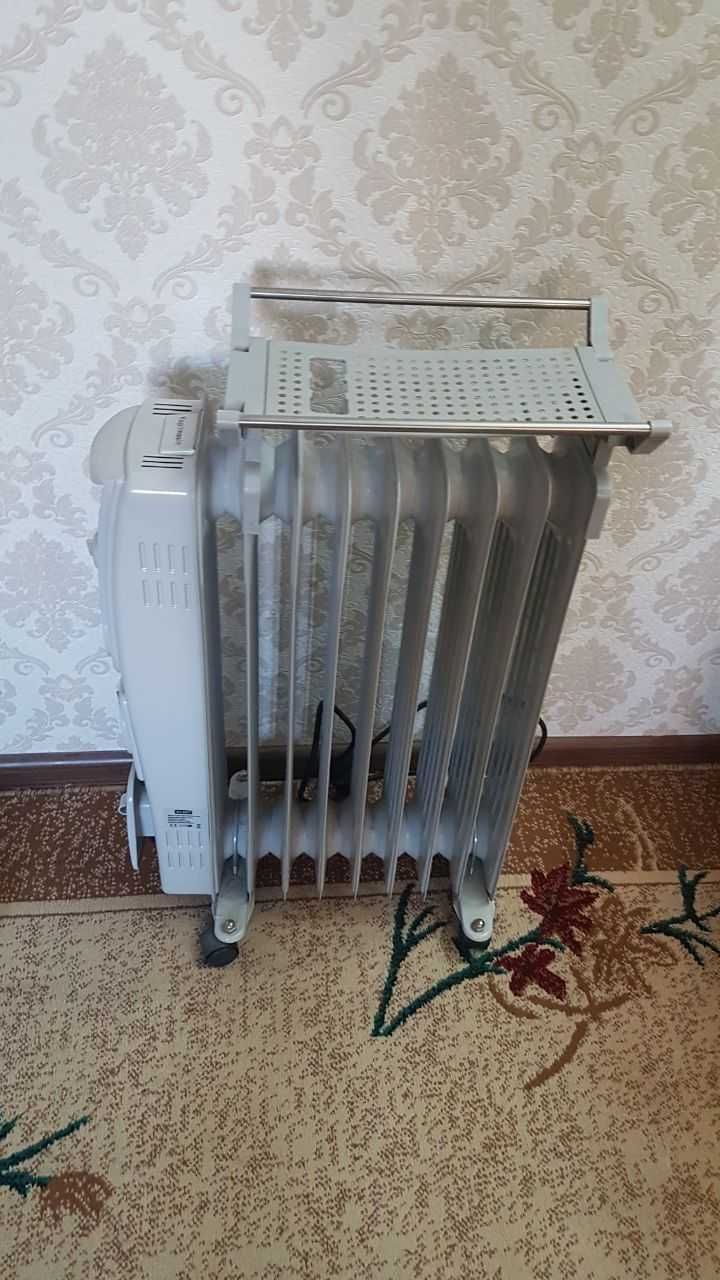 Продаётся журнальный столик, электрическая батарея и шуба