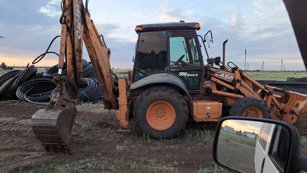 Экскаватор погрузчик 3в1 аренда, услуги