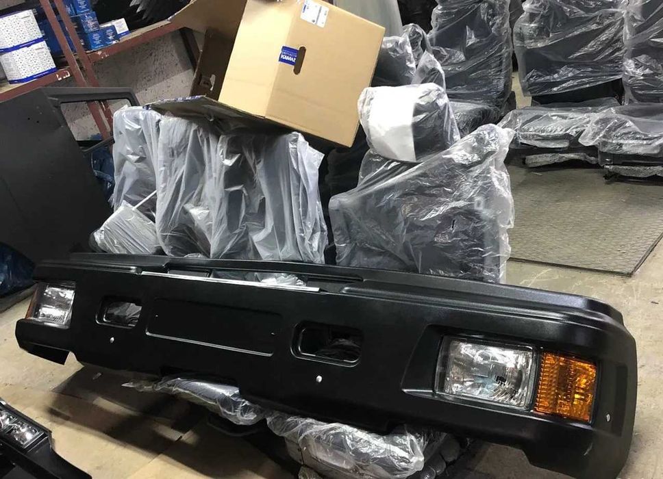 Бaмпеp KAMAZ 65115 c железом и с oрaнжевыми повоpотниками, Новый