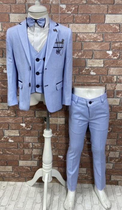 Елегантни детски костюми – стил и класа за малки джентълмени!