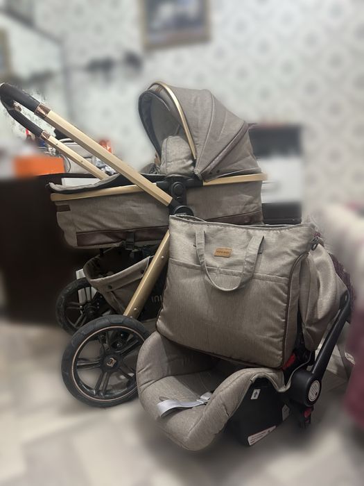 Детская коляска три в одном
